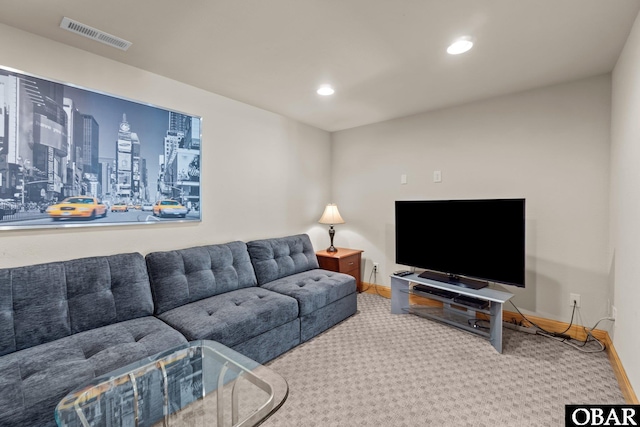 carpeted living area with baseboards, visible vents, and recessed lighting