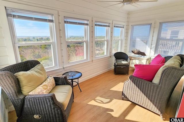 sunroom / solarium with ceiling fan