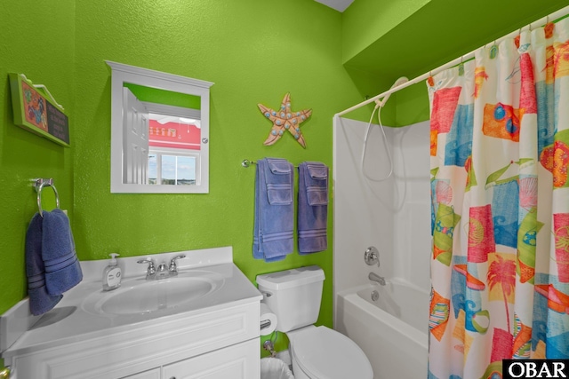 1108 Cambridge Rd Unit 307-I, Kill Devil Hills, NC 27948 - full bathroom featuring vanity, a textured wall, and shower / tub combo with curtain