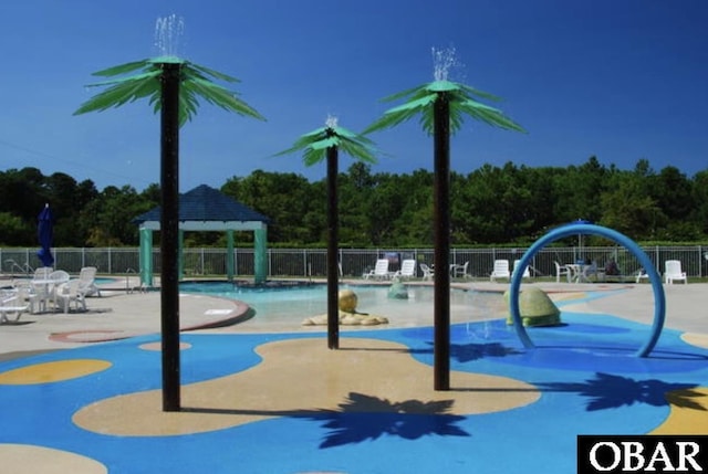 1108 Cambridge Rd Unit 307-I, Kill Devil Hills, NC 27948 - view of property's community featuring a gazebo, a swimming pool, and a patio