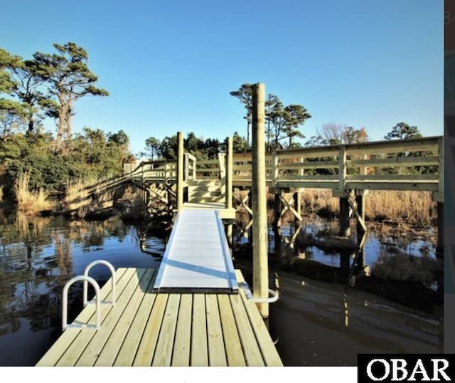 1108 Cambridge Rd Unit 307-I, Kill Devil Hills, NC 27948 - dock area featuring a water view