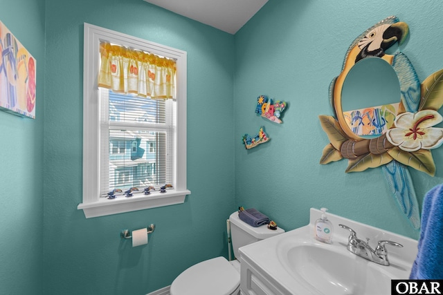 1108 Cambridge Rd Unit 307-I, Kill Devil Hills, NC 27948 - half bathroom featuring toilet and vanity