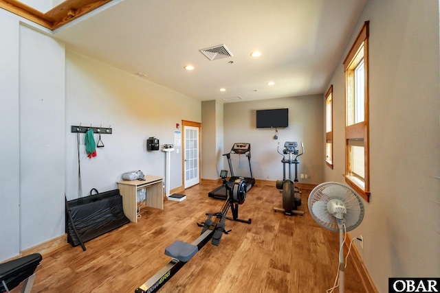 1108 Cambridge Rd Unit 307-I, Kill Devil Hills, NC 27948 - exercise area with recessed lighting, wood finished floors, plenty of natural light, and a skylight