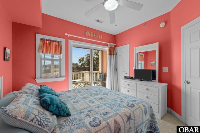 1108 Cambridge Rd Unit 307-I, Kill Devil Hills, NC 27948 - bedroom featuring access to exterior, a ceiling fan, and light carpet