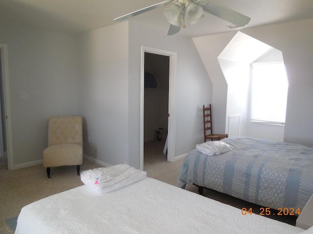 carpeted bedroom with baseboards and ceiling fan
