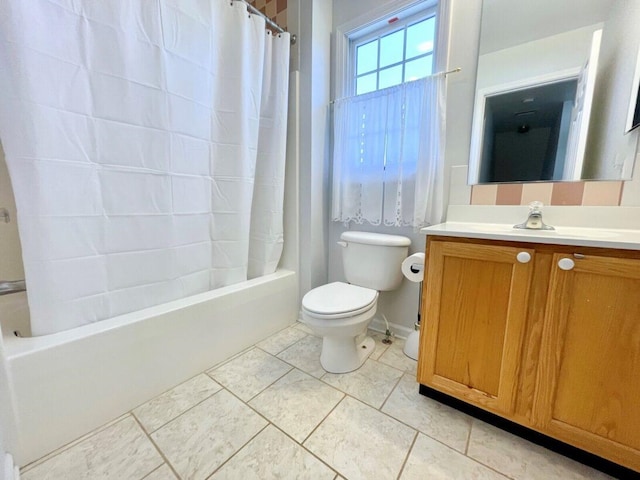 bathroom with vanity, toilet, tile patterned flooring, and shower / tub combo with curtain