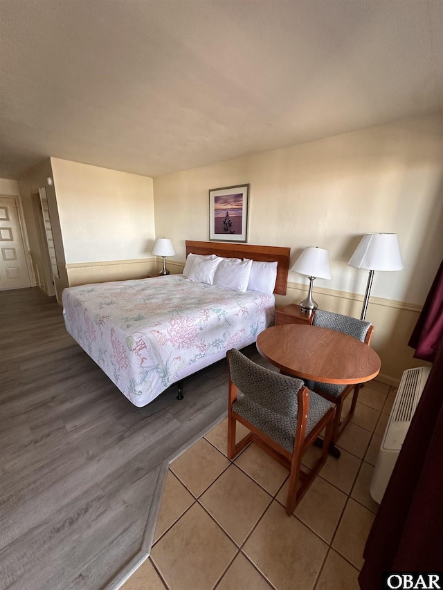 180 Irvin Garrish Hwy Unit 307/308, Ocracoke, NC 27960 - bedroom featuring light tile patterned floors and baseboards