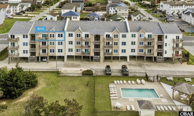 birds eye view of property with a residential view