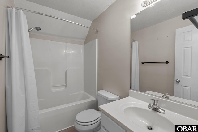 full bath featuring shower / bathtub combination with curtain, vanity, and toilet