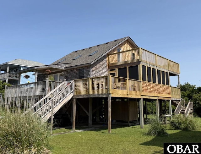 26239 Rampart St Lot 13, Salvo, NC 27972 - rear view of property featuring stairway, a lawn, a wooden deck, and a shingled roof