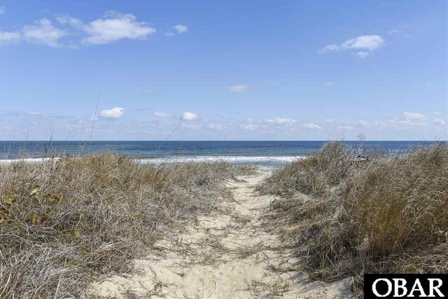 property view of water with a beach view