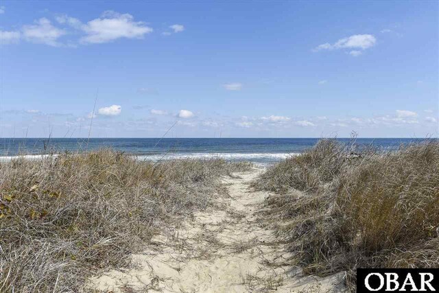 property view of water with a beach view