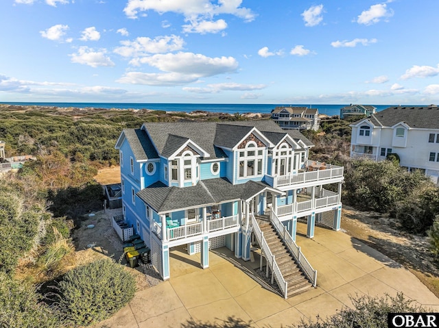 aerial view featuring a water view