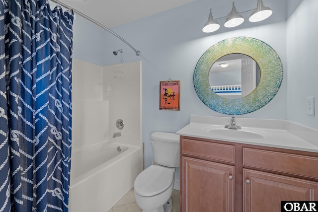 bathroom featuring shower / bath combo with shower curtain, vanity, toilet, and tile patterned floors