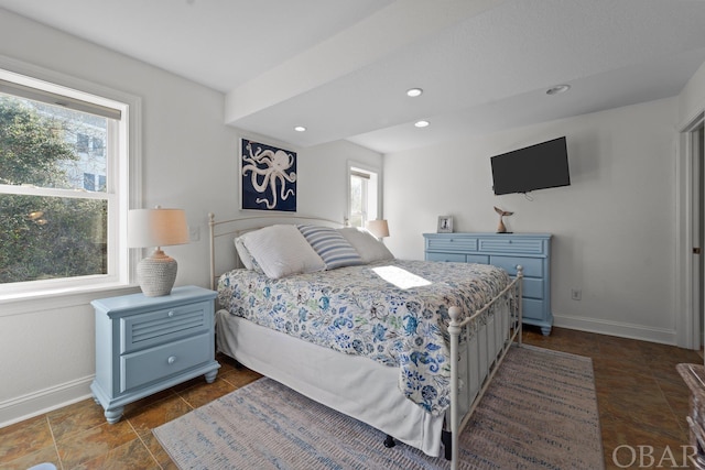 bedroom featuring recessed lighting and baseboards