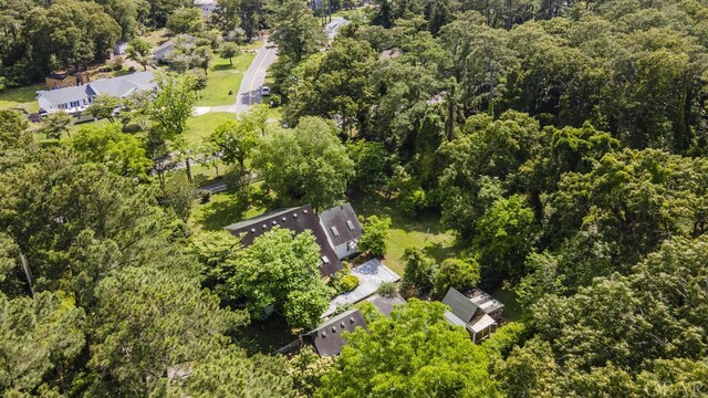 birds eye view of property with a forest view