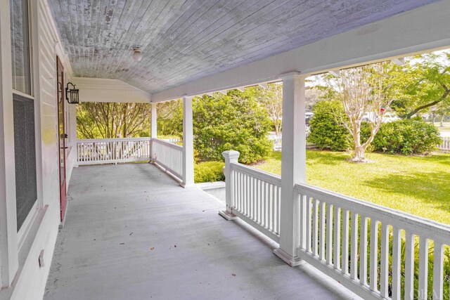 view of patio featuring a porch