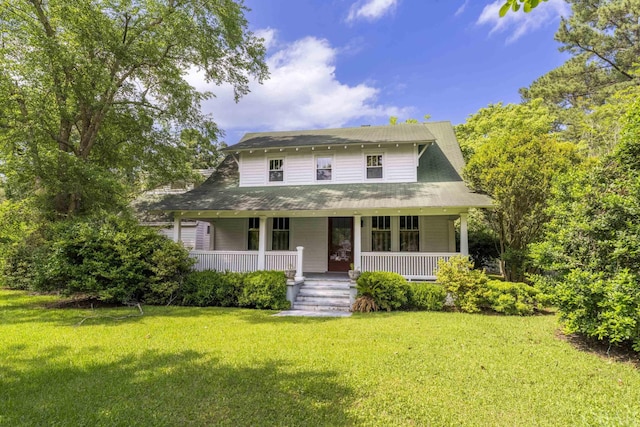 view of front of home featuring covered porch and a front yard