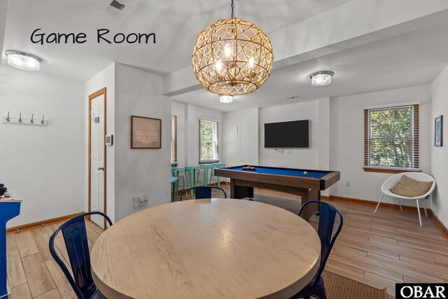 rec room featuring pool table, visible vents, a chandelier, light wood finished floors, and baseboards