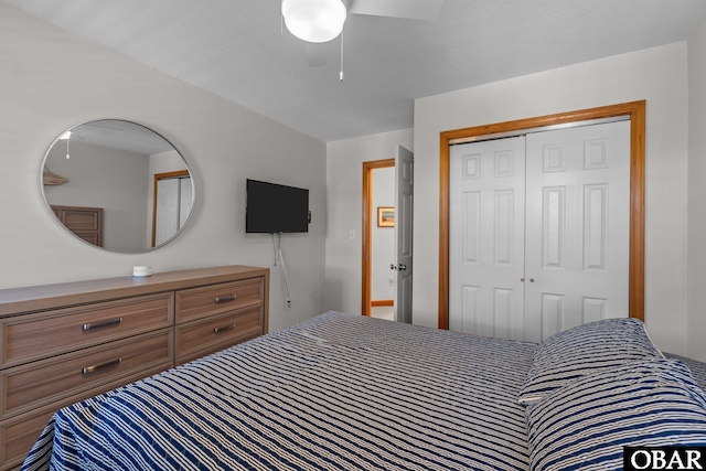 bedroom featuring a closet and a ceiling fan