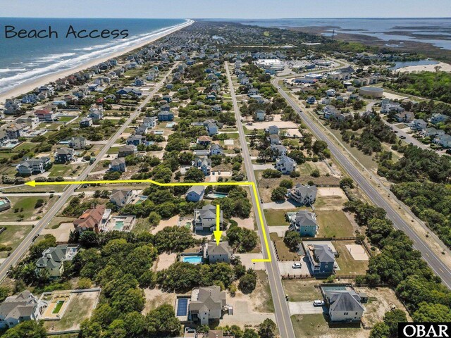 aerial view with a water view and a residential view