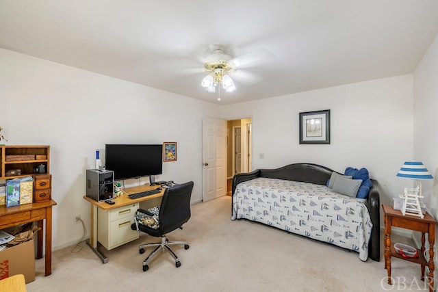 bedroom featuring light carpet and ceiling fan