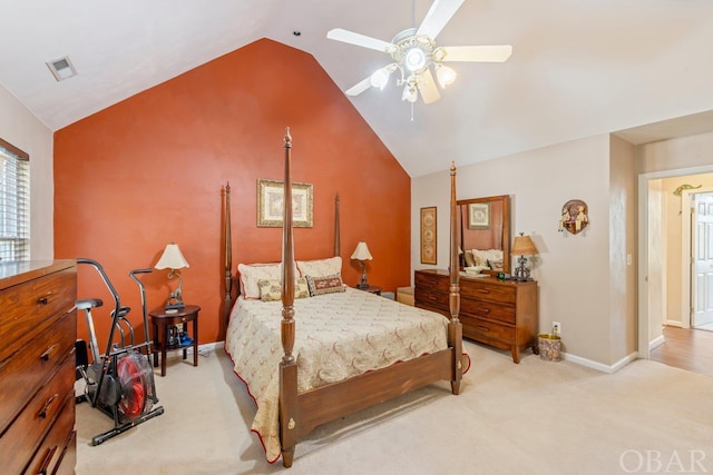 bedroom with light carpet, baseboards, visible vents, a ceiling fan, and lofted ceiling