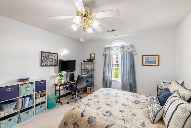 bedroom featuring ceiling fan, carpet floors, and visible vents