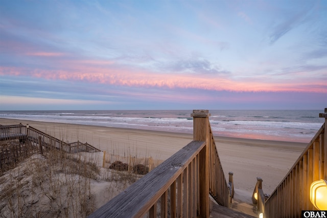 view of home's community with a view of the beach and a water view