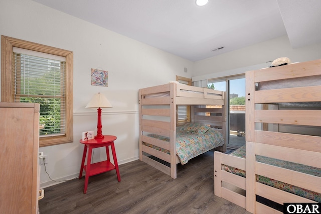 385 Deep Neck Rd Lot # 131, Corolla, NC 27927 - bedroom with wood finished floors and access to outside