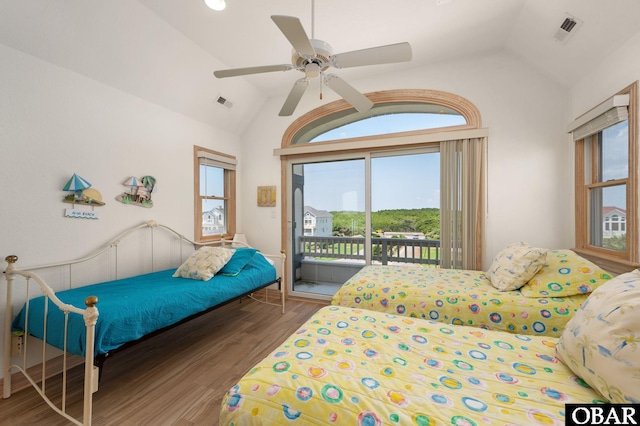 385 Deep Neck Rd Lot # 131, Corolla, NC 27927 - bedroom with vaulted ceiling, access to exterior, wood finished floors, multiple windows, and ceiling fan
