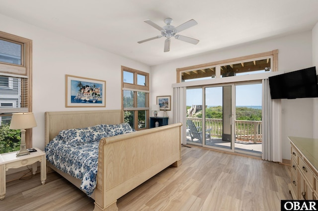 385 Deep Neck Rd Lot # 131, Corolla, NC 27927 - bedroom with access to outside, light wood-style floors, and a ceiling fan