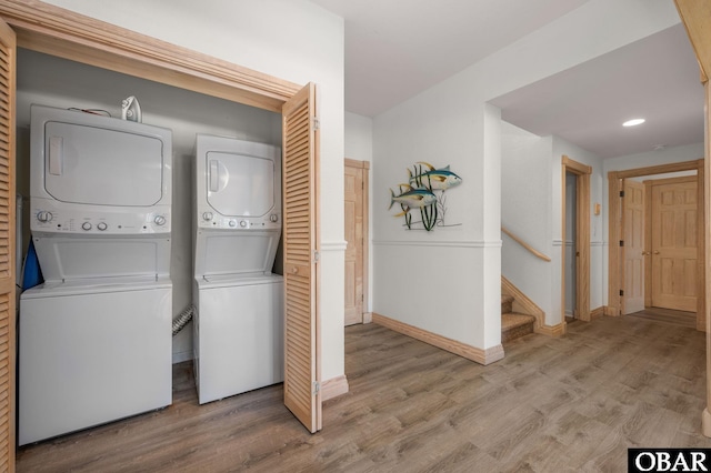 385 Deep Neck Rd Lot # 131, Corolla, NC 27927 - laundry room featuring estacked washer and dryer, wood finished floors, and recessed lighting