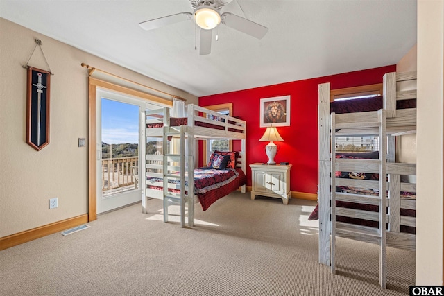 bedroom with baseboards, carpet floors, visible vents, and access to outside