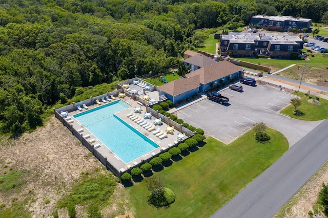 drone / aerial view with a view of trees