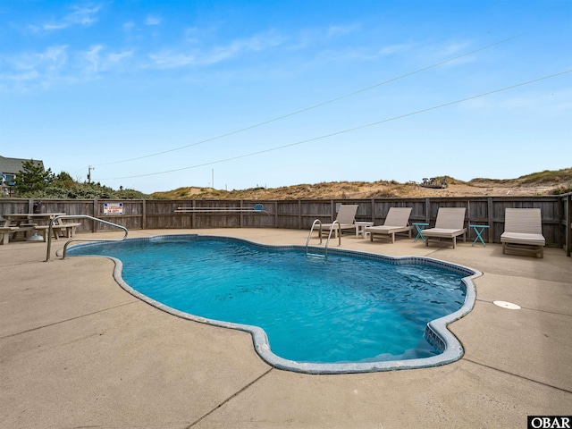 1672 Sandfiddler Rd Lot # 1 & 3, Corolla, NC 27927 - view of swimming pool with a patio, a fenced in pool, and fence