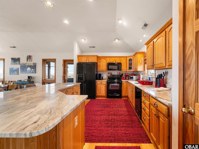 1672 Sandfiddler Rd Lot # 1 & 3, Corolla, NC 27927 - kitchen featuring visible vents, a sink, black appliances, and a healthy amount of sunlight