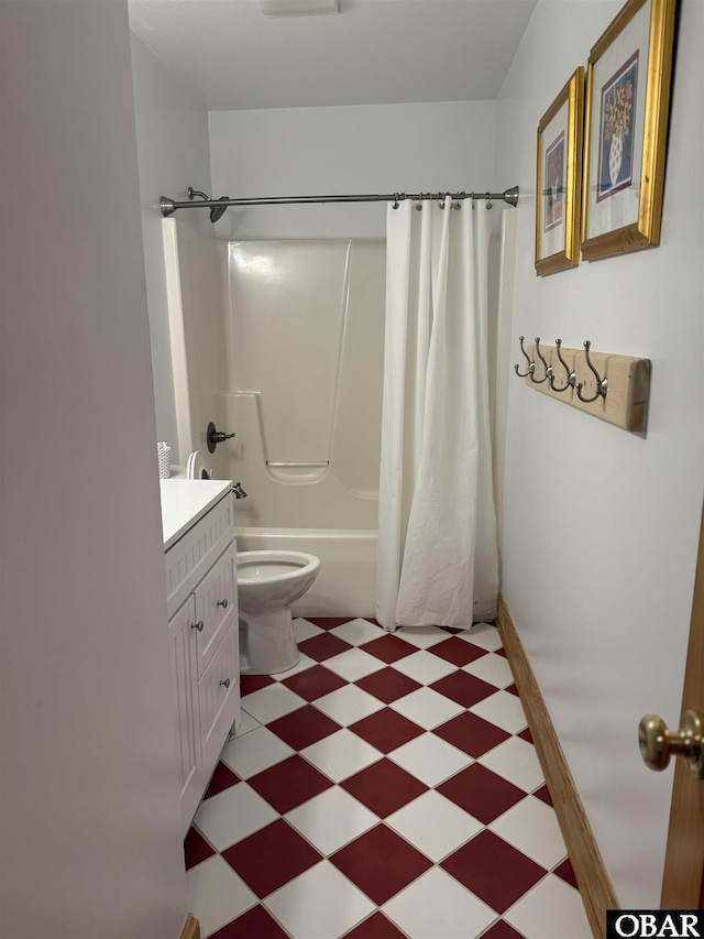 full bathroom featuring shower / tub combo with curtain, toilet, vanity, and tile patterned floors