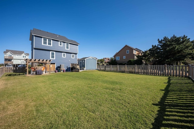 view of yard featuring a fenced backyard, an outbuilding, a storage unit, central air condition unit, and a pergola