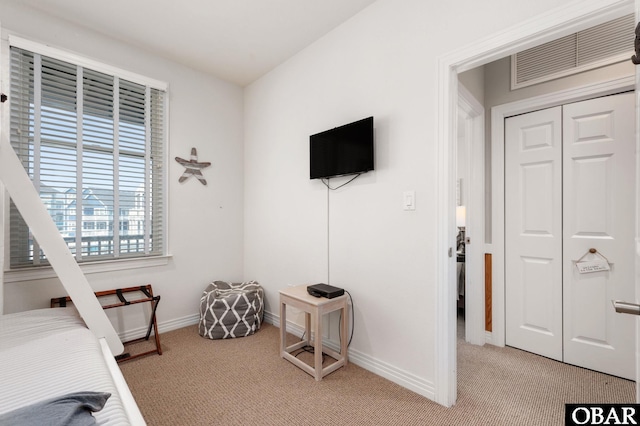 747 Hammock Ln Lot 55, Corolla, NC 27927 - bedroom with light carpet and a closet