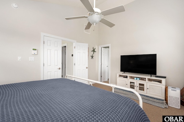 747 Hammock Ln Lot 55, Corolla, NC 27927 - carpeted bedroom featuring a towering ceiling and ceiling fan