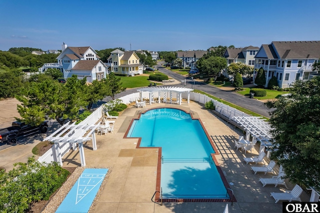 747 Hammock Ln Lot 55, Corolla, NC 27927 - community pool with a pergola, shuffleboard, and a residential view