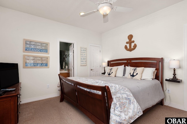 747 Hammock Ln Lot 55, Corolla, NC 27927 - bedroom featuring light colored carpet, ceiling fan, and ensuite bath