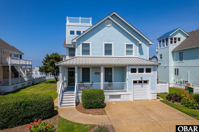 747 Hammock Ln Lot 55, Corolla, NC 27927 - view of front of property featuring a porch, stairway, a standing seam roof, and concrete driveway