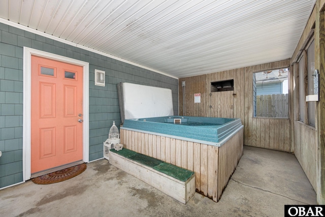 interior space with an indoor hot tub