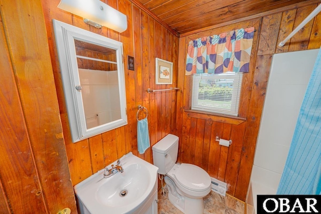 105 Rocky Mount St Lot 399, Kill Devil Hills, NC 27949 - full bath featuring wood walls, wood ceiling, a baseboard radiator, and shower / tub combo with curtain