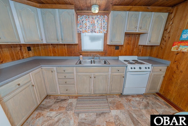 105 Rocky Mount St Lot 399, Kill Devil Hills, NC 27949 - kitchen featuring white electric range, wooden walls, wooden ceiling, light countertops, and stone finish flooring