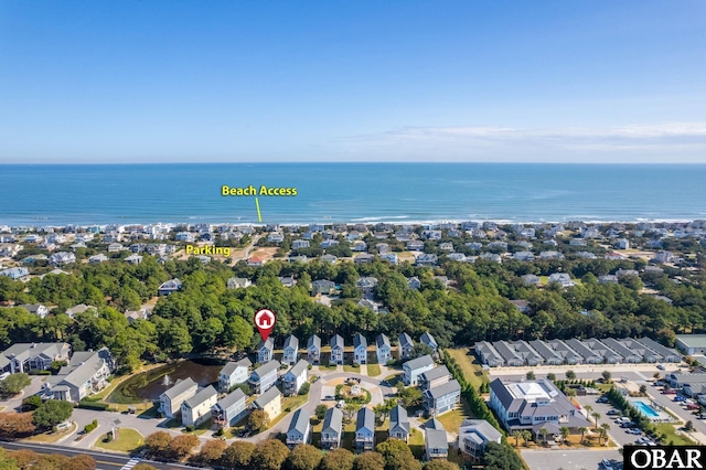 bird's eye view featuring a water view and a residential view