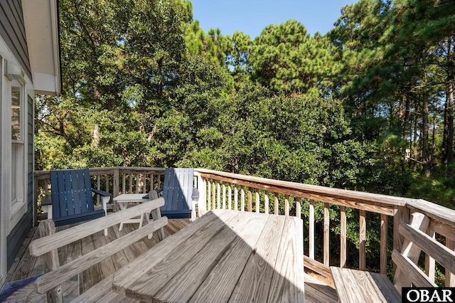 deck featuring outdoor dining space