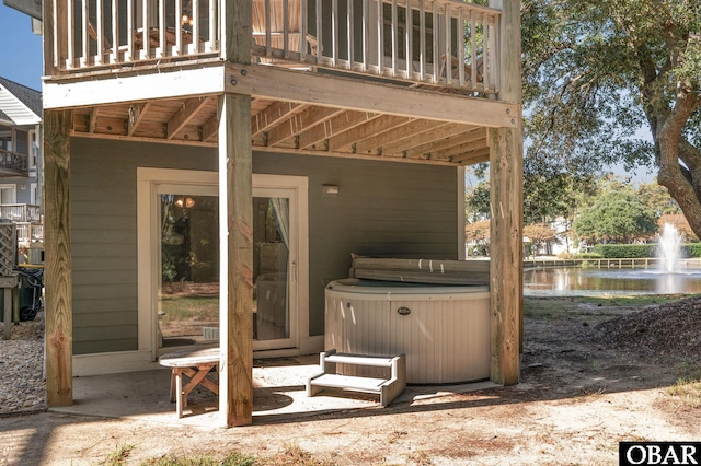 view of patio / terrace featuring a hot tub